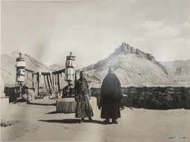 Monks at Palkhor Chode monastery Gyantse Dzong in background 