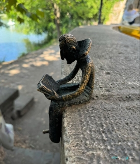 tiny Dracula statue at castle